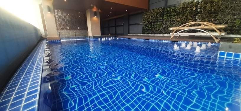 Pool bubblers and feature lighting running at night